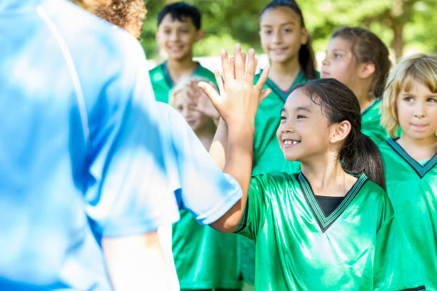 istock Diverse youth soccer team gives 610771278