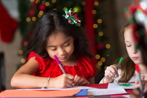 istock Young girls drawing pictures for 610771380