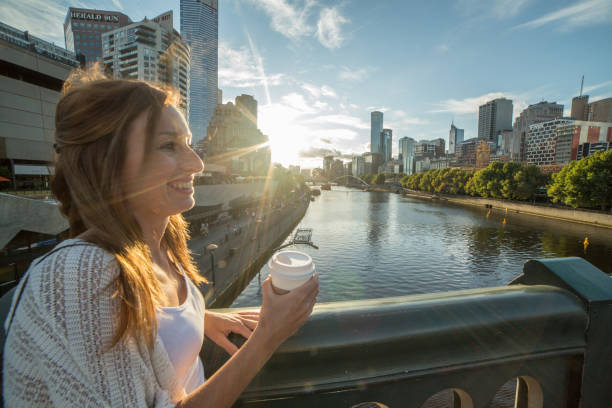 istock Young woman with coffee mug in Melbourne 610771440