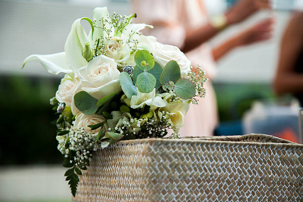 istock Beautiful wedding bouquet in a wicker box 610773532