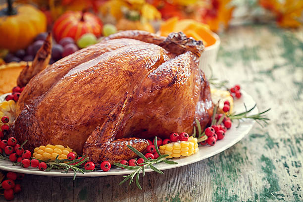 thanksgiving turkey la cena - autumn table setting flower fotografías e imágenes de stock