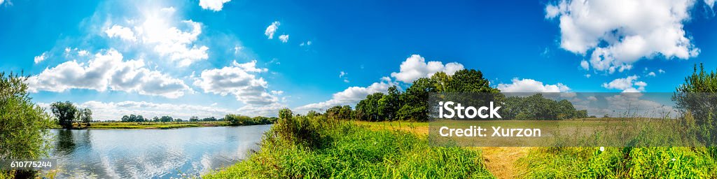 Summer landscape Panorama of a summer landscape with a river Green Color Stock Photo