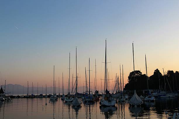 istock switzerland - sunset on leman lake 610775330