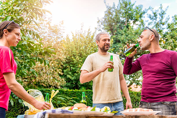 istock Friends Enjoying Drink Outdoor 610776554
