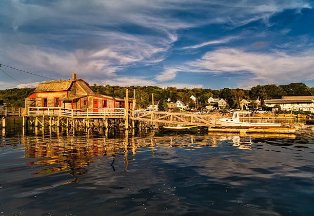 istock Harbor with rustic fishing shack in Maine 610778098