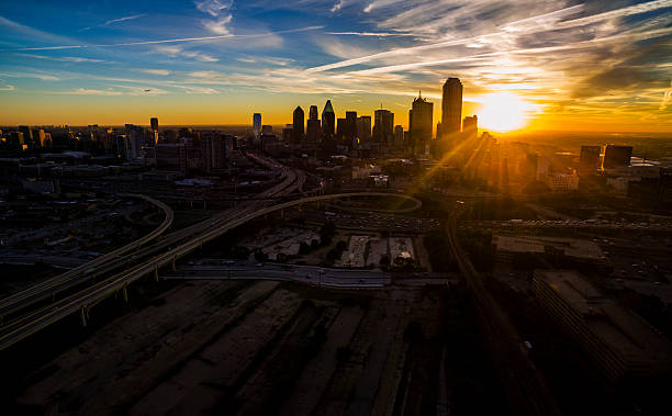 istock Aerial High Above Dallas Texas looking into Sunrise Starburst 610779476