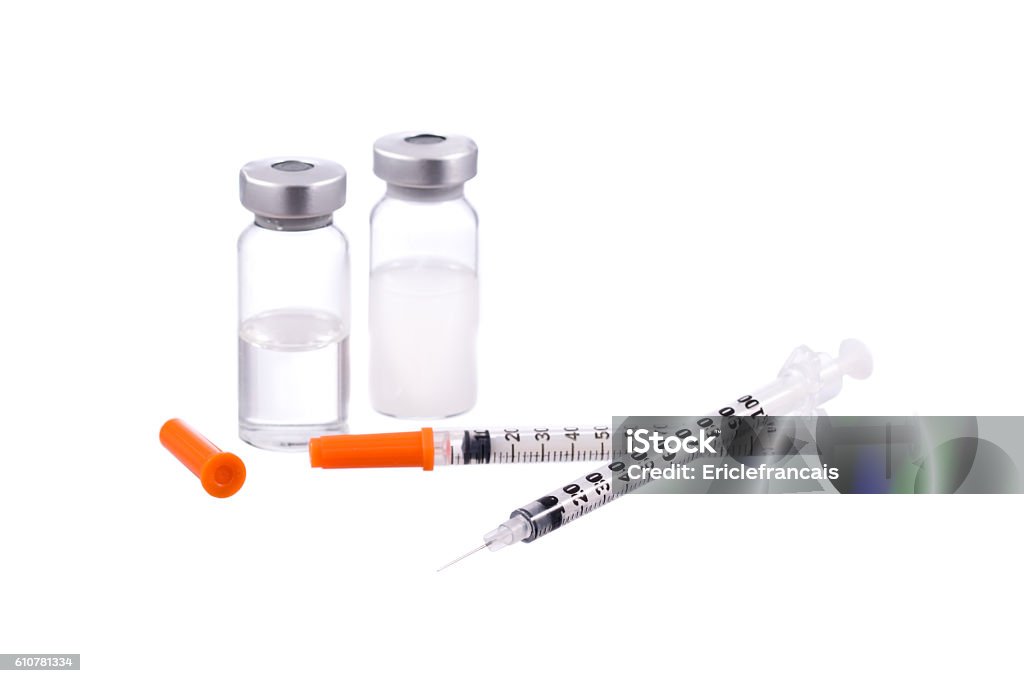 Syringes caps and bottles kits isolated on white Syringes caps and bottles kits isolated on white background Insulin Stock Photo