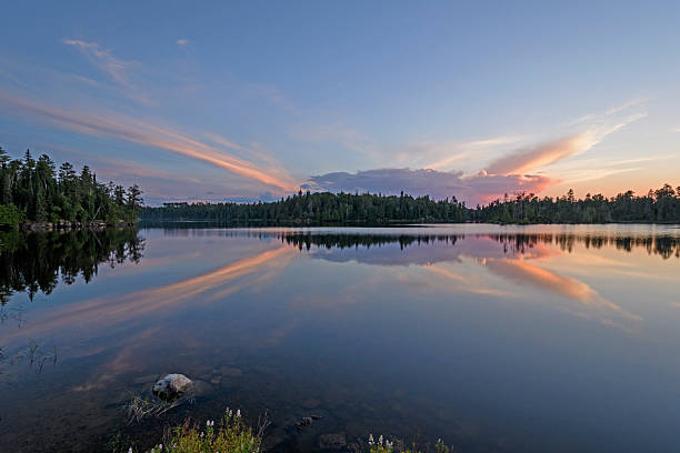 unusual clouds at sunset in the north woods - boundary waters canoe area imagens e fotografias de stock