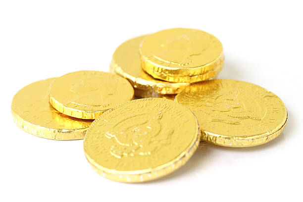 istock Gold foil covered chocolate coins 610783524