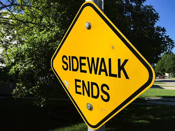 istock Yellow Diamond Shaped SIDEWALK ENDS sign 610783824