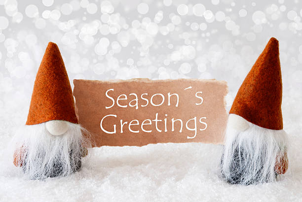 istock Bronze Gnomes With Card, Text Seasons Greetings 610783932