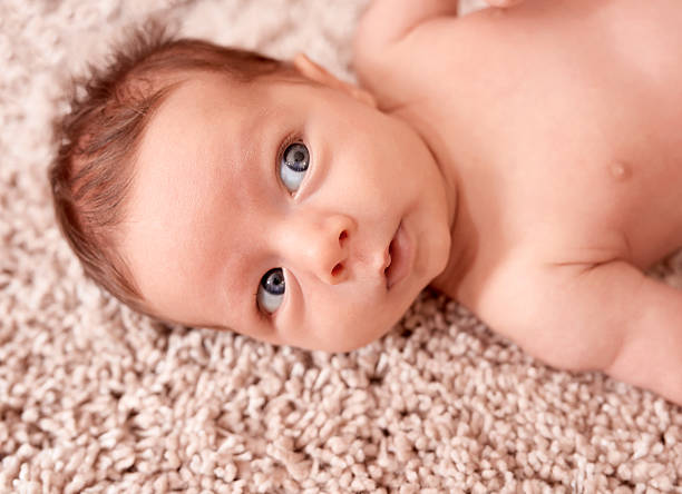 istock innocent baby boy portrait 610836662
