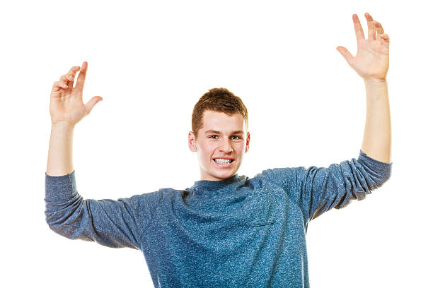 istock Happy man successful lad with arms up 610838210
