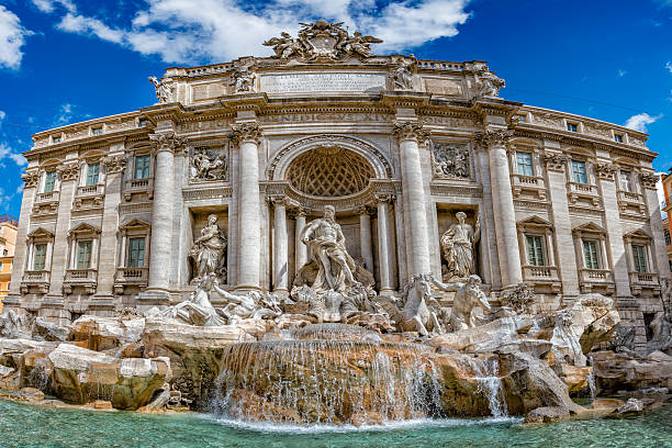 istock Rome Trevi Fountain view on sunny day 610840040