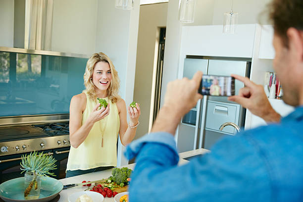 istock Showing off her cooking skills on cam 610840392