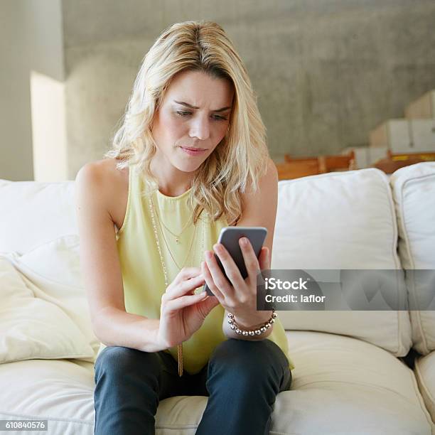 Not The News She Was Hoping For Stock Photo - Download Image Now - Sofa, Women, Anxiety