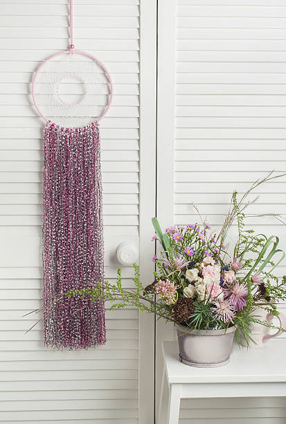 istock Pink dream catcher with flowers 610843254