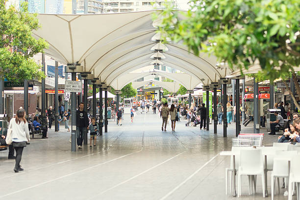 Bondi Junction Sydney, Australia - November 8, 2015: Color image of the famous Bondi Junction in Australia during weekend. People are walking around, having snack or shopping. Bondi Junction is the main connection hub between Bondi Beach and Sydney downtown. bondi junction stock pictures, royalty-free photos & images