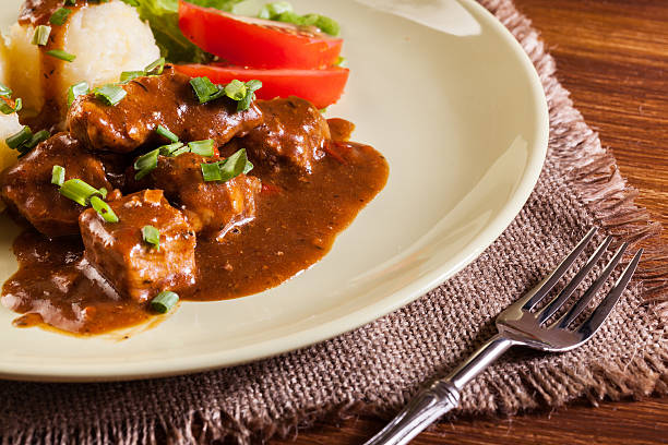 istock Goulash with boiled potatoes 610844394