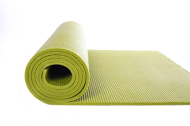 istock green yoga mat isolated on white background 610848668