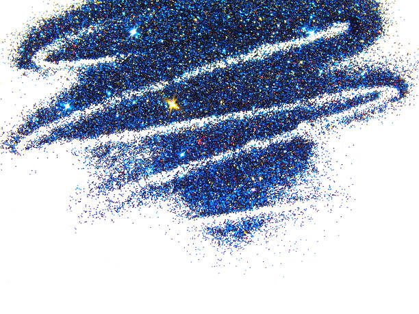 istock Blue, red and golden glitter sparkle on white background 610850458