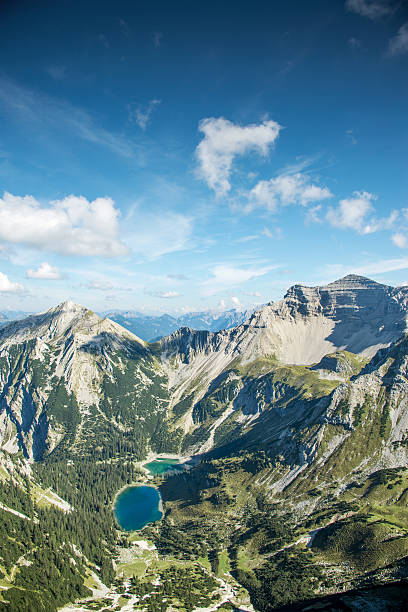 Alps, Clouds, Lakes. stock photo