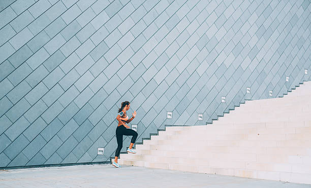 istock Running Up The Stairs 610851750