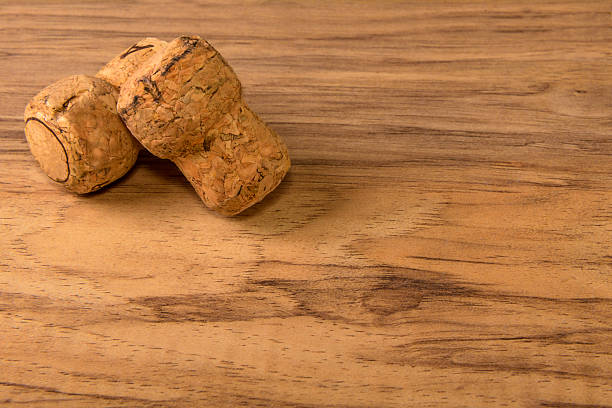 istock stoppers from champagne on a wooden background, 610856212