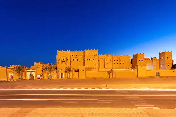 The Taourirt Kasbah in Ouarzazate in Morocco at night. Taourirt Casbah is one of the most impressive monuments in Morocco.
