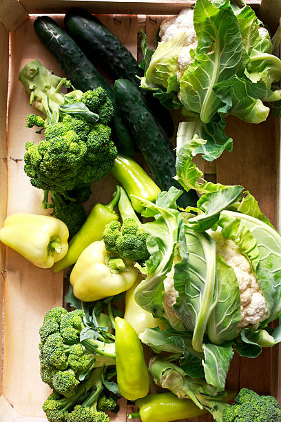istock fresh vegetables in wooden crates 610856944