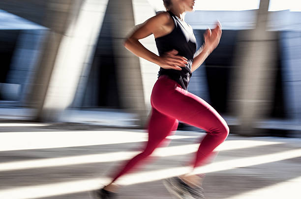 istock Female Athlete Running Outdoors 610857344
