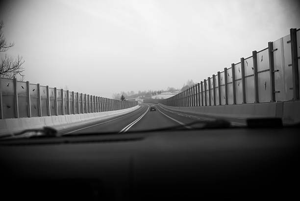 istock Highway, cold weather, black and white 610858404