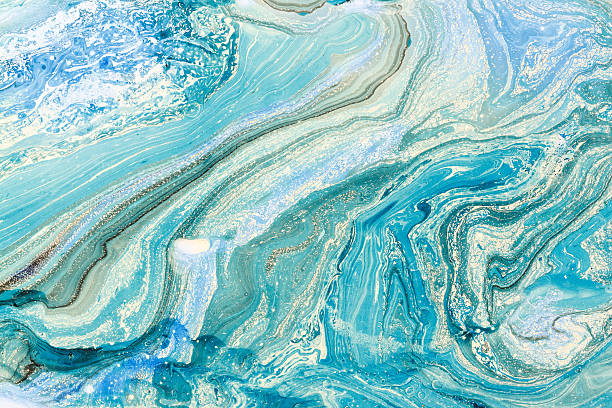 Creative background with abstract oil painted waves handmade surface. Blue marbling texture. Creative background with abstract oil painted waves handmade surface. Liquid paint. marble rock photos stock pictures, royalty-free photos & images