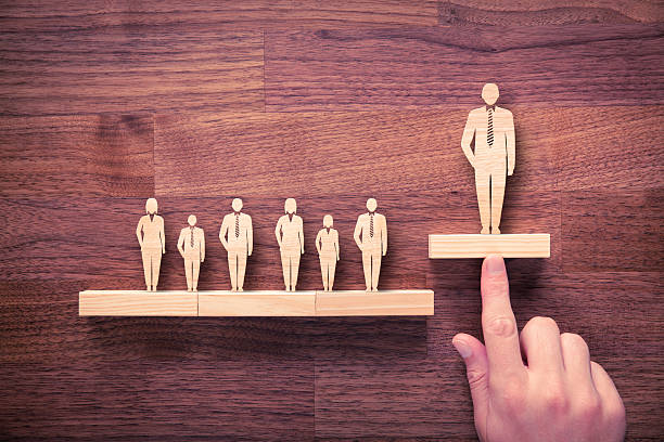 Successful leader Successful team leader (manager, CEO, market leader) and another business leading concepts. Standing out from the crowd. chief leader stock pictures, royalty-free photos & images