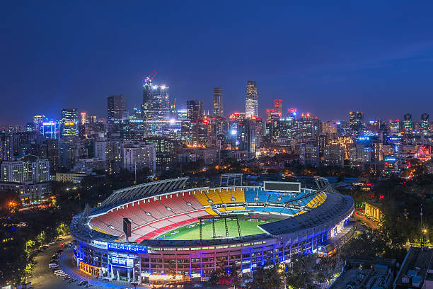 Huanglong Sports Center in Hangzhou, Zhejiang, China. The circular architecture of the parking structures and the modern design of the stadium complex.