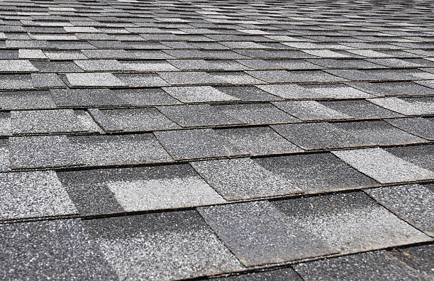 istock Asphalt Roofing Shingles Background. Roof Shingles - Roofing. 610862132