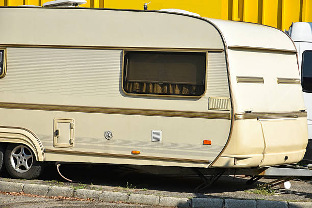 istock Old caravan in the parking lot 610866796