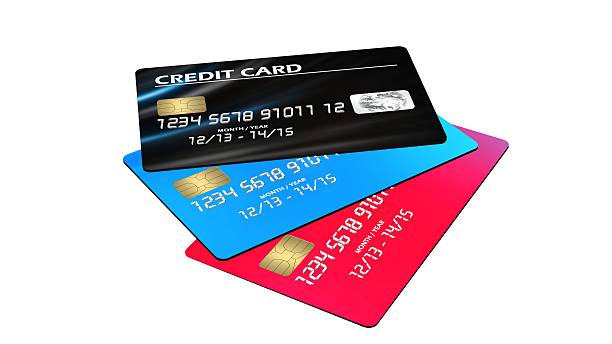 istock three Credit Cards  isolated on white background 610868000