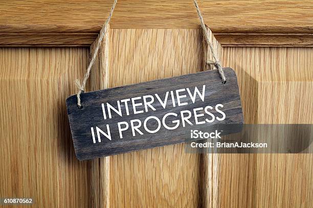 Interview In Progress Sign On Office Door Stock Photo - Download Image Now - Job Interview, Interview - Event, Placard