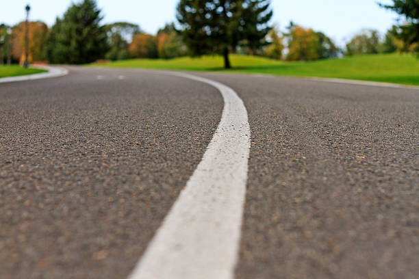 istock new asphalt cover in the park 610872588
