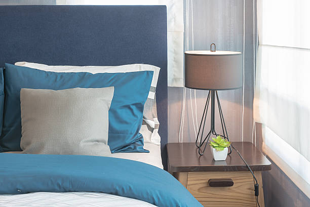 istock modern blue color tone bedroom with lamp 610874288