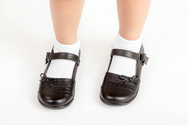 istock Young School Girl Student Wearing Black Shoes 610874436