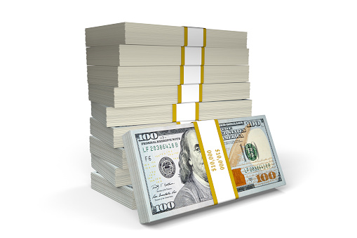 Stack of Money.  Bundles of ten thousand dollars totaling $100000 on a white background with clipping path.  