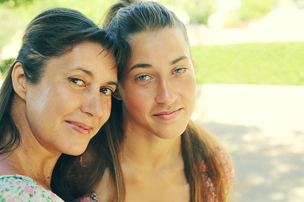istock Young girl with her mother 610876178
