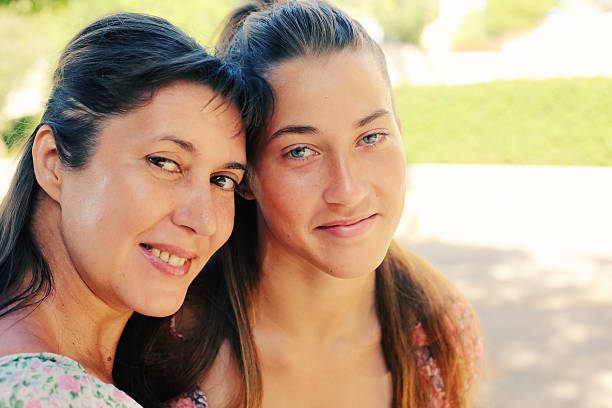istock Young girl with her mother 610876240