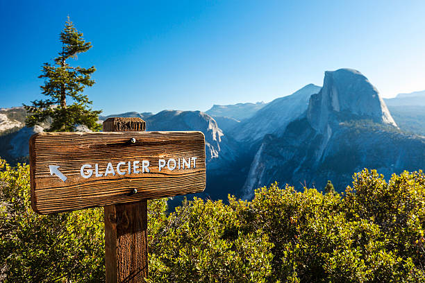 Half Dome In Yosemite National Park Sign for Glacier Point in Yosemite National Park. mariposa county stock pictures, royalty-free photos & images