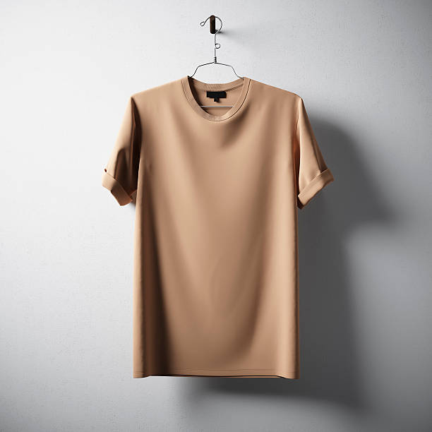 istock Blank Brown Cotton Tshirt Hanging Center Concrete White Empty Background 610876574