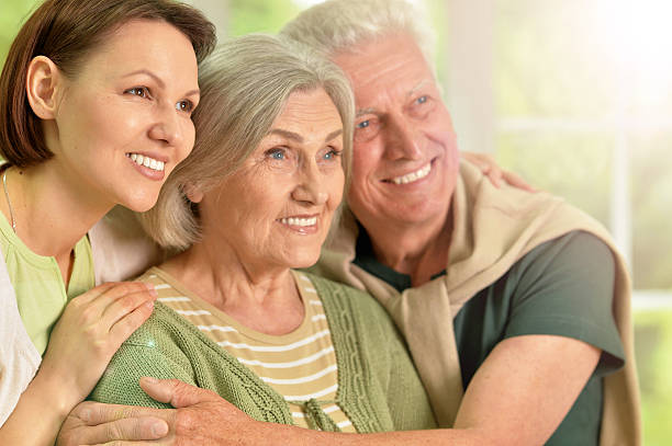 istock Happy senior parents with daughter 610876932
