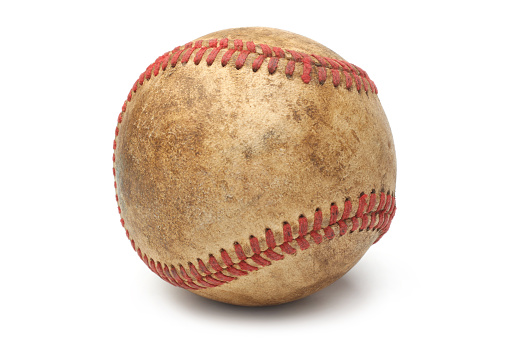 Old baseball on white background