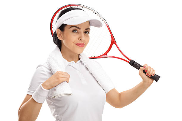 istock Female tennis player posing with racket and towel 610878852